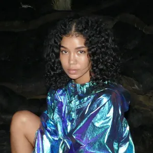 Caption: Jhene Aiko In A Stunning Photoshoot Wallpaper