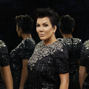 Caption: Kris Jenner Contemplating Her Reflection Wallpaper