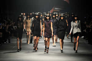 Caption: Lanvin Models Strutting The Runway At A Fashion Show Wallpaper