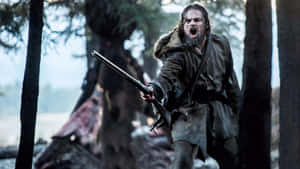 Caption: Leonardo Dicaprio In The Revenant Under A Wintry Sky Wallpaper