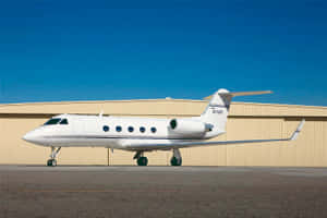 Caption: Majestic Private Jet Ready For Departure Wallpaper