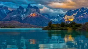 Caption: Majestic View Of Fitz Roy Near Lake In Argentina Wallpaper