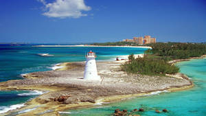 Caption: Majestic White Lighthouse In Nassau, Bahamas Wallpaper