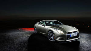 Caption: Master Of Speed: Matte Gray Nissan Gt-r In 4k Wallpaper