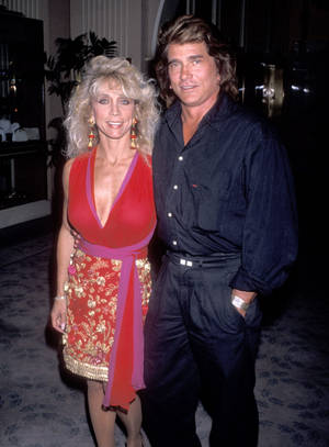 Caption: Michael Landon And Cindy Landon Smiling At A Public Event Wallpaper