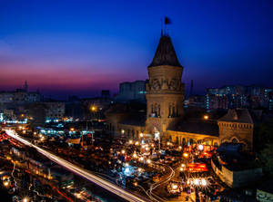 Caption: Night View Of The Iconic Empress Market In Karachi Wallpaper