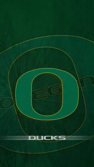 Caption: Oregon Ducks Football Team Charging Onto The Field Wallpaper