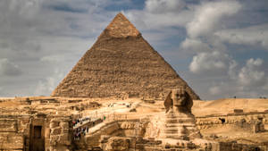 Caption: Scenic Beauty Of Pyramid And Sphinx In Egypt Wallpaper