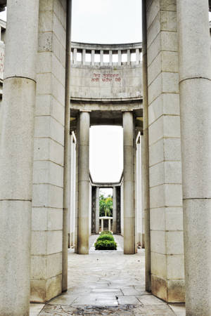 Caption: Solemn Beauty At Yangon Military Cemetery Wallpaper