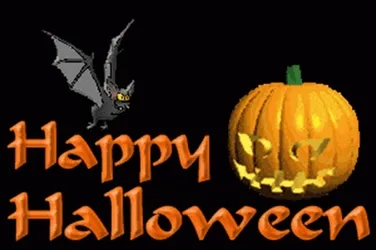 Caption: Spooky Halloween Night Scene With Jack-o'-lanterns Wallpaper
