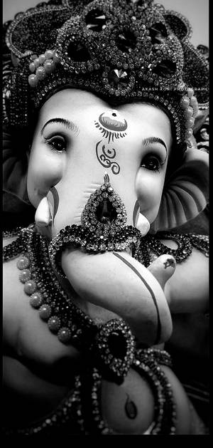 Caption: Striking Ganesh Graphic Art On An Iphone Wallpaper