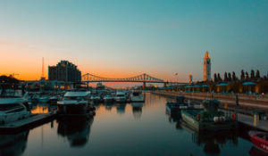 **caption**: Stunning View Of Montreal Waterfront Attraction Wallpaper