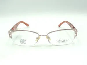 Caption: Stylish Unisex Luxe Eyeglass Embellished With Swarovski Elements Wallpaper