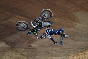Caption: Thrill Of Backflip At X Games Motocross Event Wallpaper