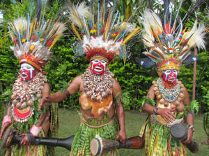 Caption: Vibrant Culture Of Papua New Guinea Natives Wallpaper