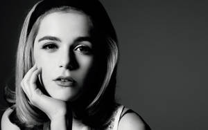 Caption: Vibrant Retro Kiernan Shipka Portrait Wallpaper