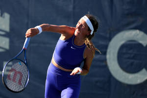 Caption: Victoria Azarenka In Action Wallpaper