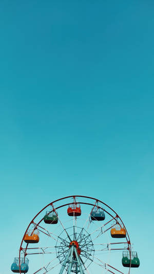 Caption: Whimsical Blue Ferris Wheel In Minimalist Style Wallpaper