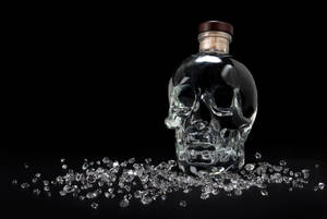 Captivating Crystal Head Vodka With Radiant Shattered Crystals Wallpaper