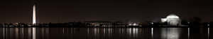 Captivating Darkness Across Three Monitors Wallpaper