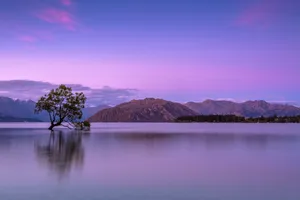 Captivating Dusk Over Tranquil Plains Wallpaper