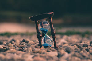 Captivating Hourglass Marking Time's Passage Wallpaper