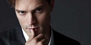 Captivating Shot Of Jamie Dornan, A Charismatic Hollywood Actor. Wallpaper