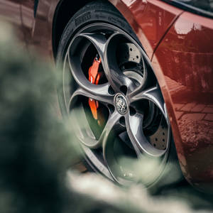 Capturing The Beauty Of Alfa Romeo Giulia's Wheels Wallpaper