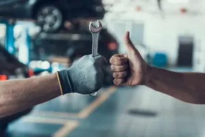 Car Mechanics Maintenance Thumbs Up Wallpaper