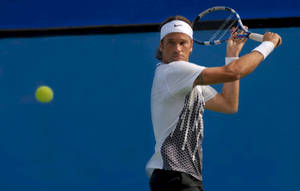 Carlos Moya In Action - Tennis Match Wallpaper