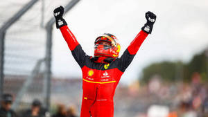 Carlos Sainz Jr Victory Pose Wallpaper