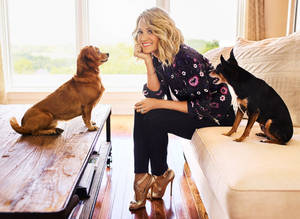Carrie Underwood With Her Dogs Wallpaper