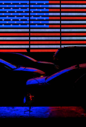 Cars Under Neon American Flag Wallpaper