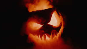 Carved Pumpkin On Fire Wallpaper