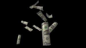 Cash_ Falling_ Against_ Black_ Background.jpg Wallpaper