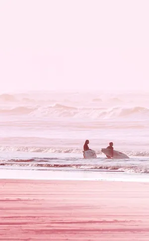 Catch The Dusk While Relaxing At The Pink Beach Aesthetic Wallpaper