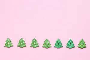 Celebrate The Holidays With A Festive Pink Christmas Tree Wallpaper