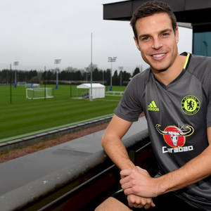 César Azpilicueta Relaxing With A Cheerful Smile Wallpaper