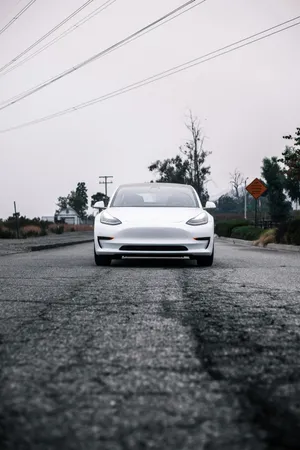 Charge Your Iphone With A Tesla Powerbank Wallpaper