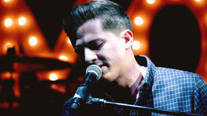 Charlie Puth On Dark Stage Wallpaper