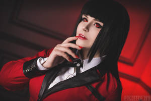 Chic And Glamorous Woman In Stunning Kakegurui Cosplay Wallpaper