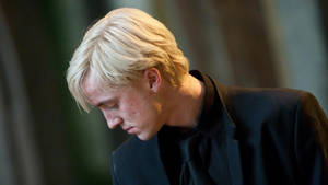 Chic Tom Felton Side Profile Wallpaper