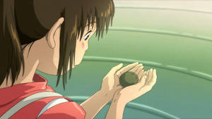 Chihiro Holding Herbal Cake Spirited Away Desktop Wallpaper