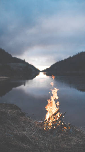 Chill Bonfire By The Lake Wallpaper