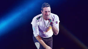 Chris Martin On Stage Wallpaper