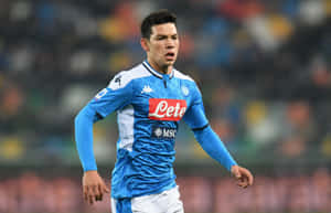 Chucky Lozano In Action On The Soccer Field Wallpaper