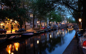 City River In Amsterdam Netherlands Wallpaper