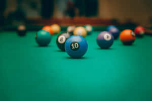 Classic Blue Pool Table With Number 10 Ball Wallpaper