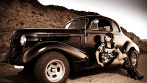 Classic Car And A Woman Wallpaper