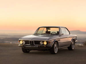 Classic Polaris Metallic Bmw In Vibrant Setting Wallpaper